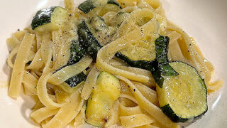 Sliced zucchini grilled until tender, tossed with pasta in a classic carbonara sauce.