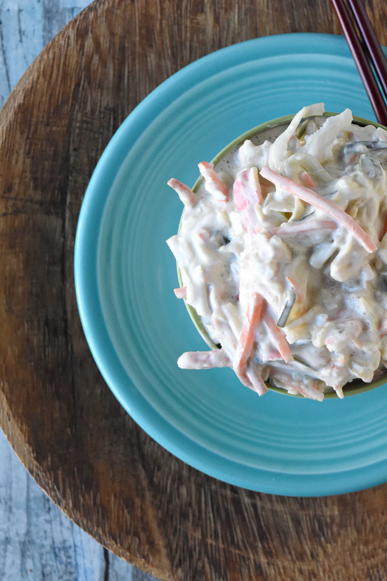 Cool, creamy, crunchy, and ready for sushi night at home. This Japanese kani salad uses imitation crab, crisp veggies, sesame, and spicy mayo dressing.  #kanisalad #japaneserecipe #sushinightathome #imitationcrab #seafoodsalad #easyasianrecipes #crunchysalad #weeknightrecipes #foodblogger #homemadejapanesefood