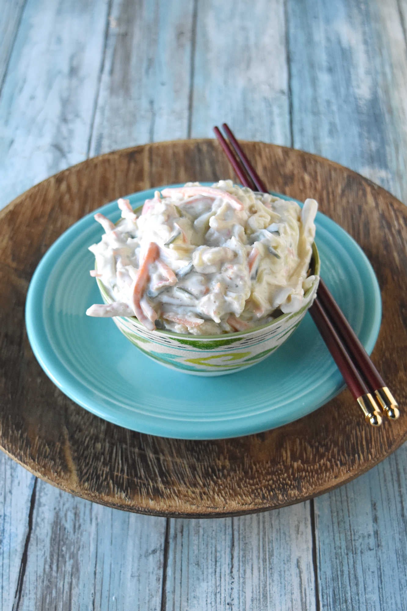 Cool, creamy, crunchy, and ready for sushi night at home. This Japanese kani salad uses imitation crab, crisp veggies, sesame, and spicy mayo dressing.  #kanisalad #japaneserecipe #sushinightathome #imitationcrab #seafoodsalad #easyasianrecipes #crunchysalad #weeknightrecipes #foodblogger #homemadejapanesefood