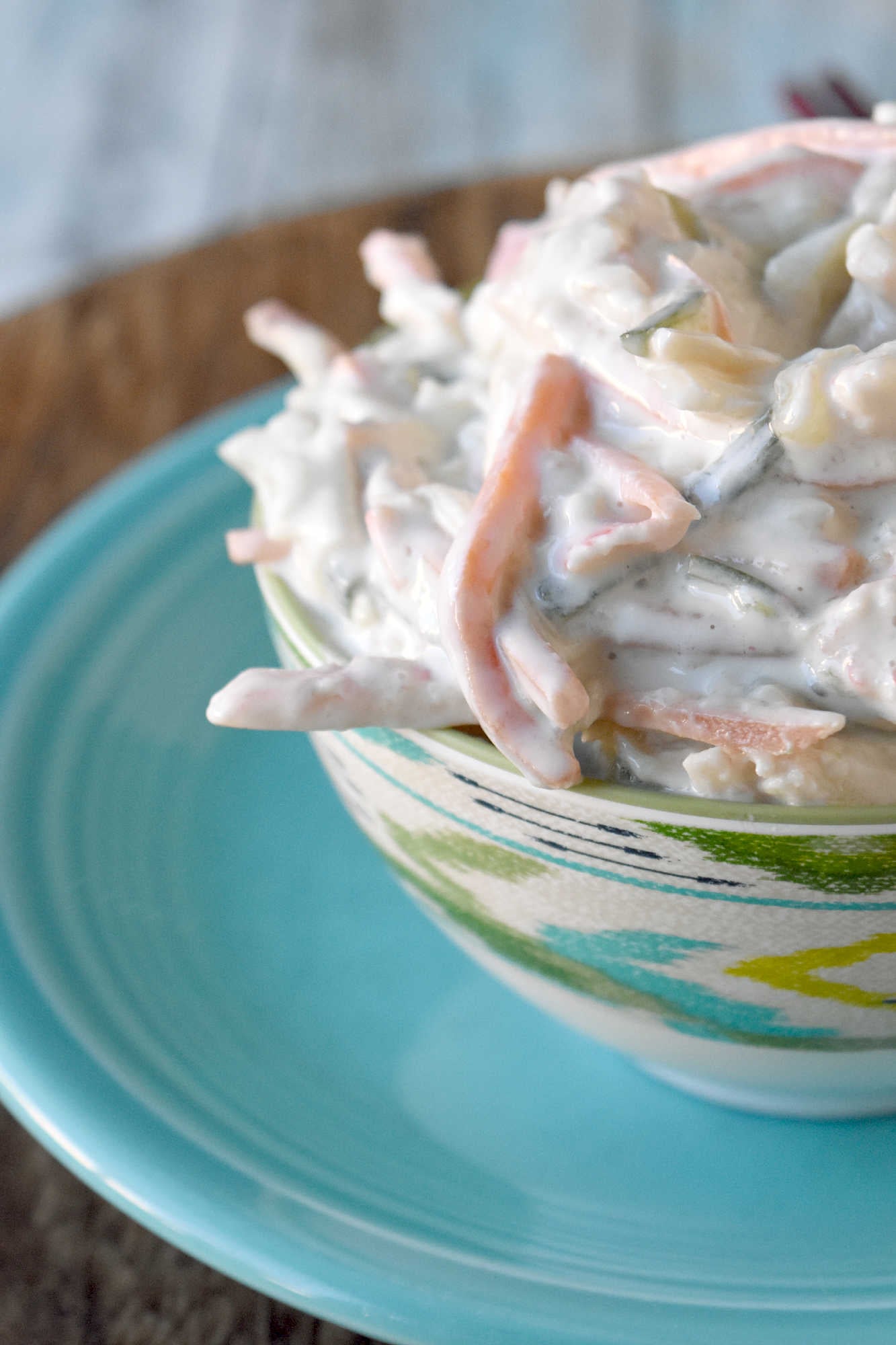 Cool, creamy, crunchy, and ready for sushi night at home. This Japanese kani salad uses imitation crab, crisp veggies, sesame, and spicy mayo dressing.  #kanisalad #japaneserecipe #sushinightathome #imitationcrab #seafoodsalad #easyasianrecipes #crunchysalad #weeknightrecipes #foodblogger #homemadejapanesefood