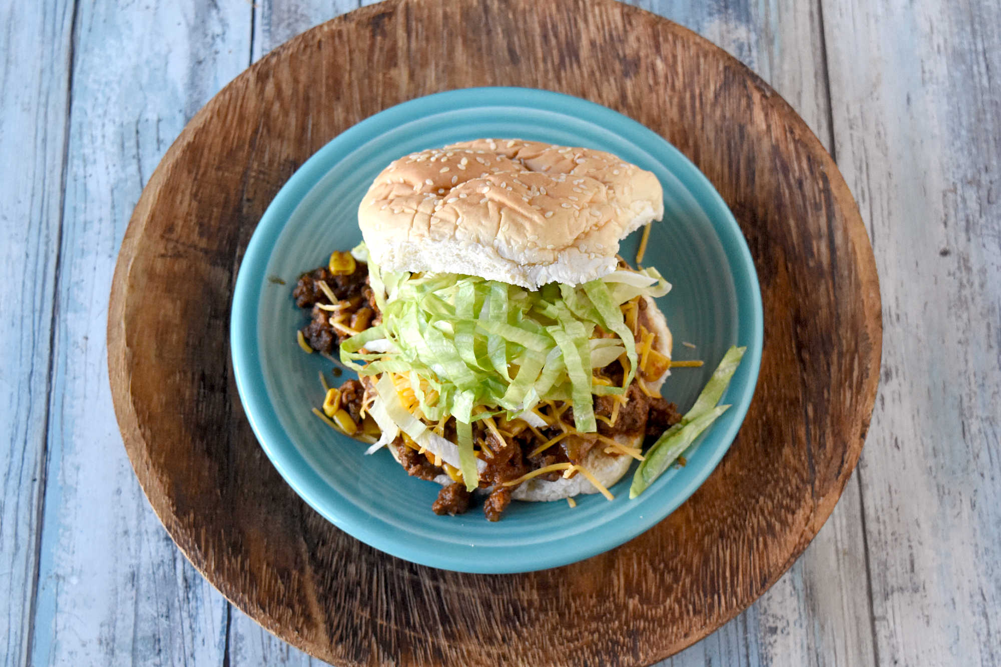 This Easy Taco Sloppy Joes recipe combines lean ground turkey, salsa, corn, cheddar cheese, and smoky chipotle flavor for a quick one-pan dinner the whole family loves. Perfect for busy weeknights, meal prep, and budget-friendly meals. #FarmersMarketWeek #TacoSloppyJoes #EasyDinner #GroundTurkeyRecipes #WeeknightDinner #FamilyMeals #BudgetMeals #DinnerIdeas #OnePanMeals #ComfortFood