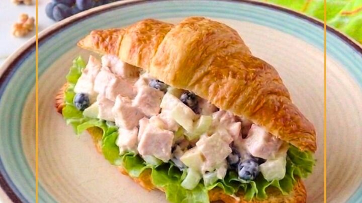 Delightful Waldorf Chicken Salad combining crisp apples, juicy grapes, and toasted walnuts with leftover chicken and a creamy dressing.