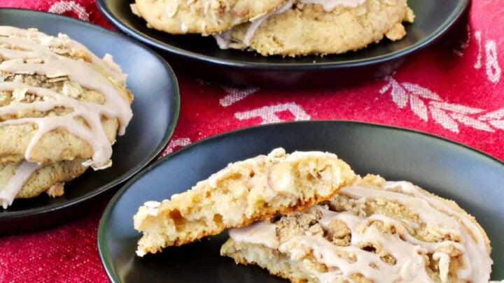 These apple cookies, with a spicy oat streusel and a cinnamon glaze, are moist and filled with chunks of fresh apple. They are a great for a snack or dessert. The apple flavor is enhanced by the flavors of fall, including cinnamon, nutmeg, allspice, and brown sugar.