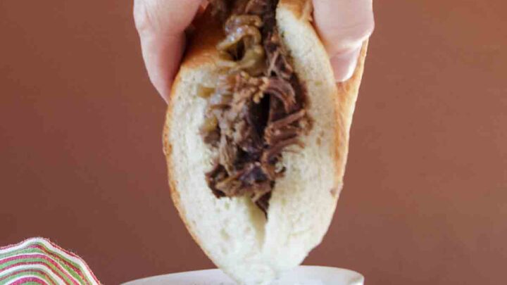 Crockpot French Dip au Jus is thin sliced, tender beef, on crusty French bread, with a tasty dipping juice for a fun easy sandwich.
