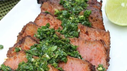 This grilled, seasoned skirt streak is topped with a fresh kale chimichurri sauce. So much flavor and easy to make!