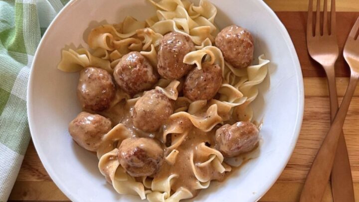 Crock Pot Swedish Meatballs use frozen homestyle meatballs in creamy mushroom gravy for an easy slow cooker dinner over egg noodles or rice.