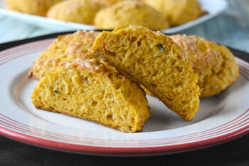 Pumpkin parmesan drop biscuits are a must-have for biscuit lovers seeking something unique. The combination of pumpkin purée and grated parmesan creates a rich, savory flavor in every bite. #PumpkinRecipes #DropBiscuits #SavoryBiscuits #FallRecipes #ThanksgivingSides #HolidayRecipes #EasyBreadRecipes #FallFlavors