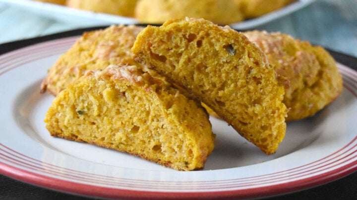 Pumpkin parmesan drop biscuits are a must-have for biscuit lovers seeking something unique. The combination of pumpkin purée and grated parmesan creates a rich, savory flavor in every bite. #PumpkinRecipes #DropBiscuits #SavoryBiscuits #FallRecipes #ThanksgivingSides #HolidayRecipes #EasyBreadRecipes #FallFlavors