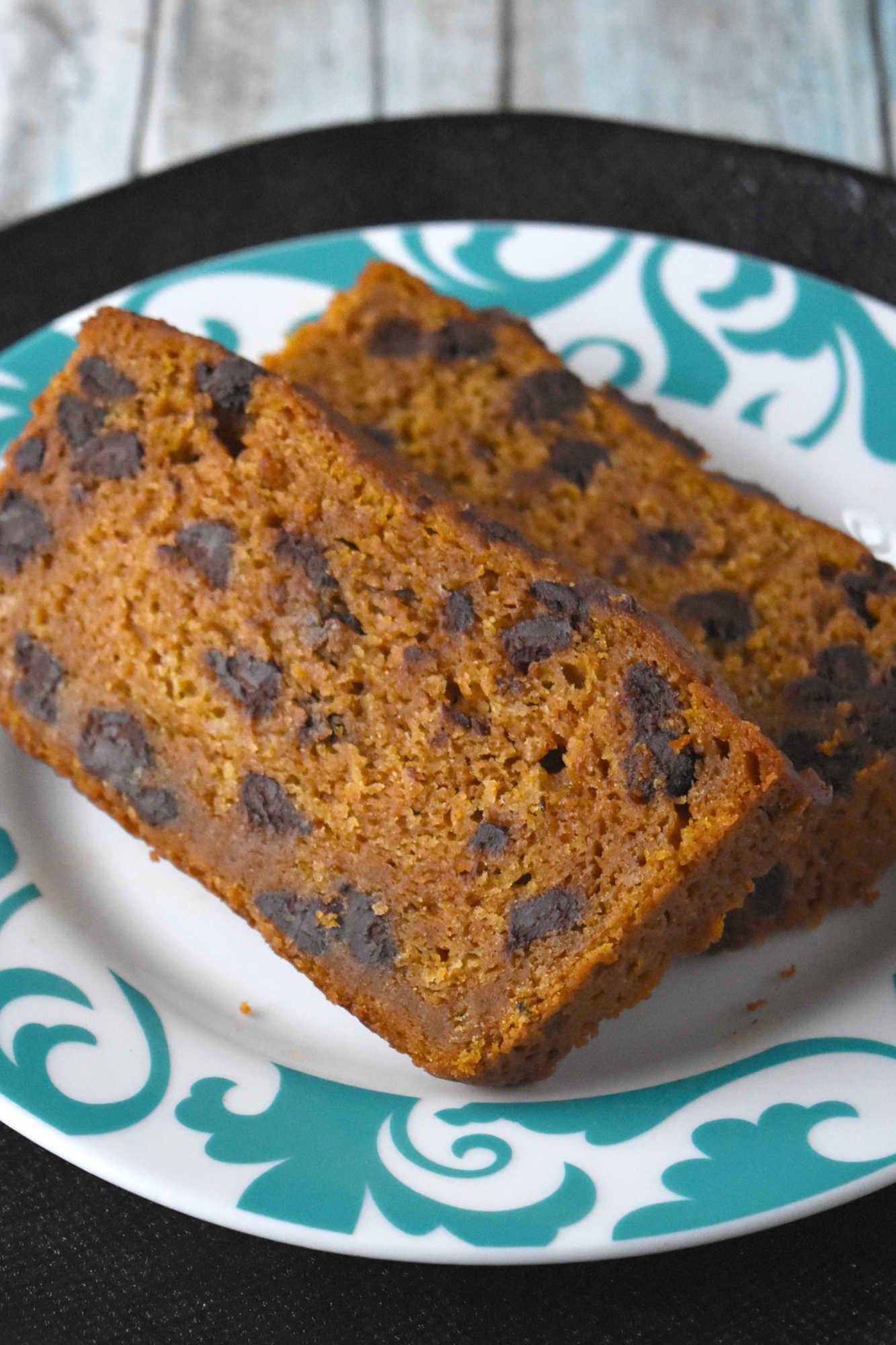 Soft pumpkin bread, melty chocolate chips, and a cozy gingerbread spice twist make this loaf feel like fall in every slice. Serve it with coffee, brunch, or a quiet afternoon treat.  #PumpkinBread #ChocolateChipBread #FallBaking #PumpkinRecipes #QuickBread #FallFlavors #CozyBakes #AutumnRecipes