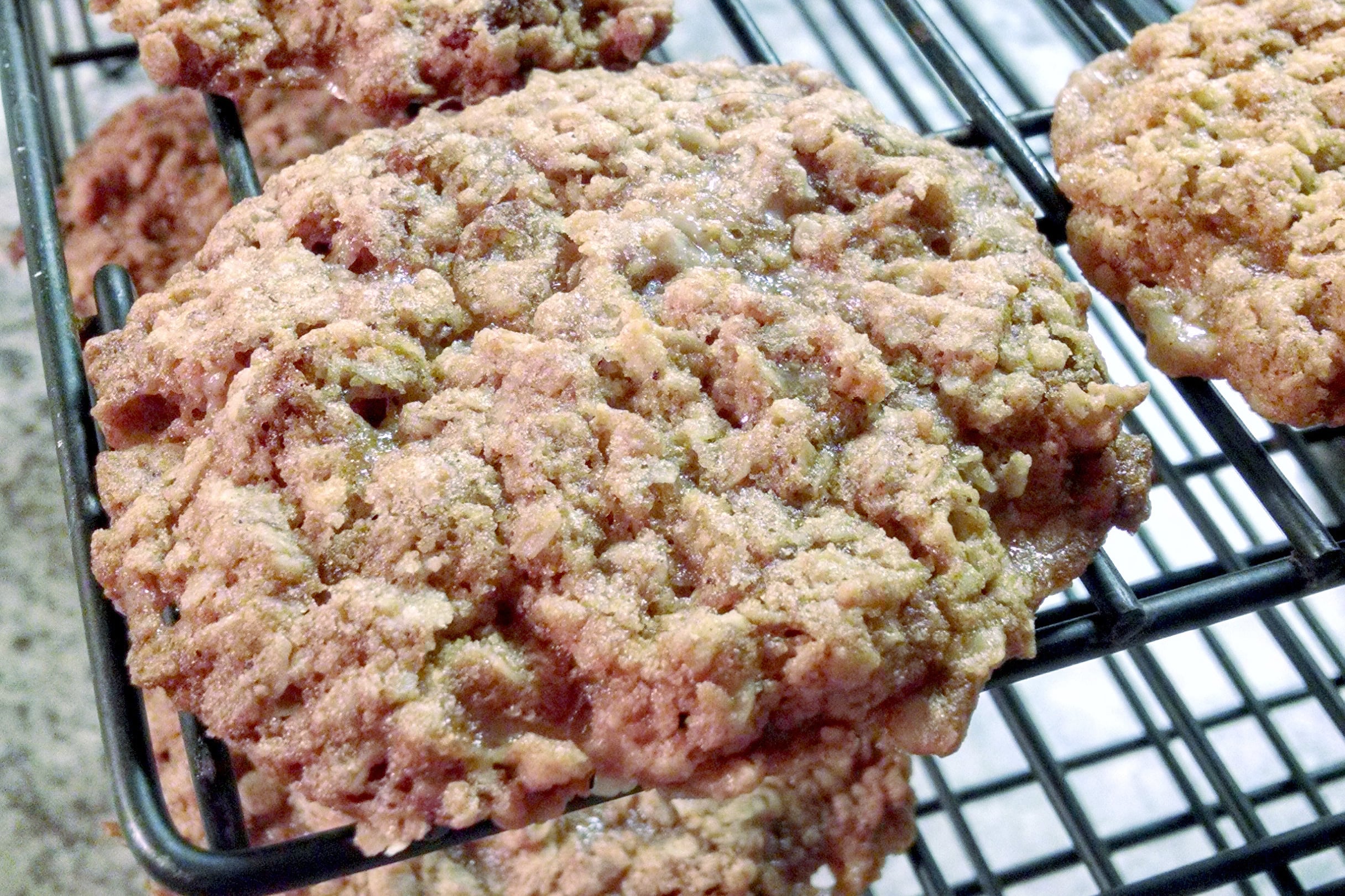 Classic oatmeal raisin cookies meet buttery candy-shop crunch in this chewy toffee cookie recipe. These Oatmeal Raisin Toffe Cookies are cozy enough for fall baking and fun enough for a cookie tray. #OatmealCookies #RaisinCookies #ToffeeCookies #CookieRecipe #HolidayBaking #OurFamilyTable