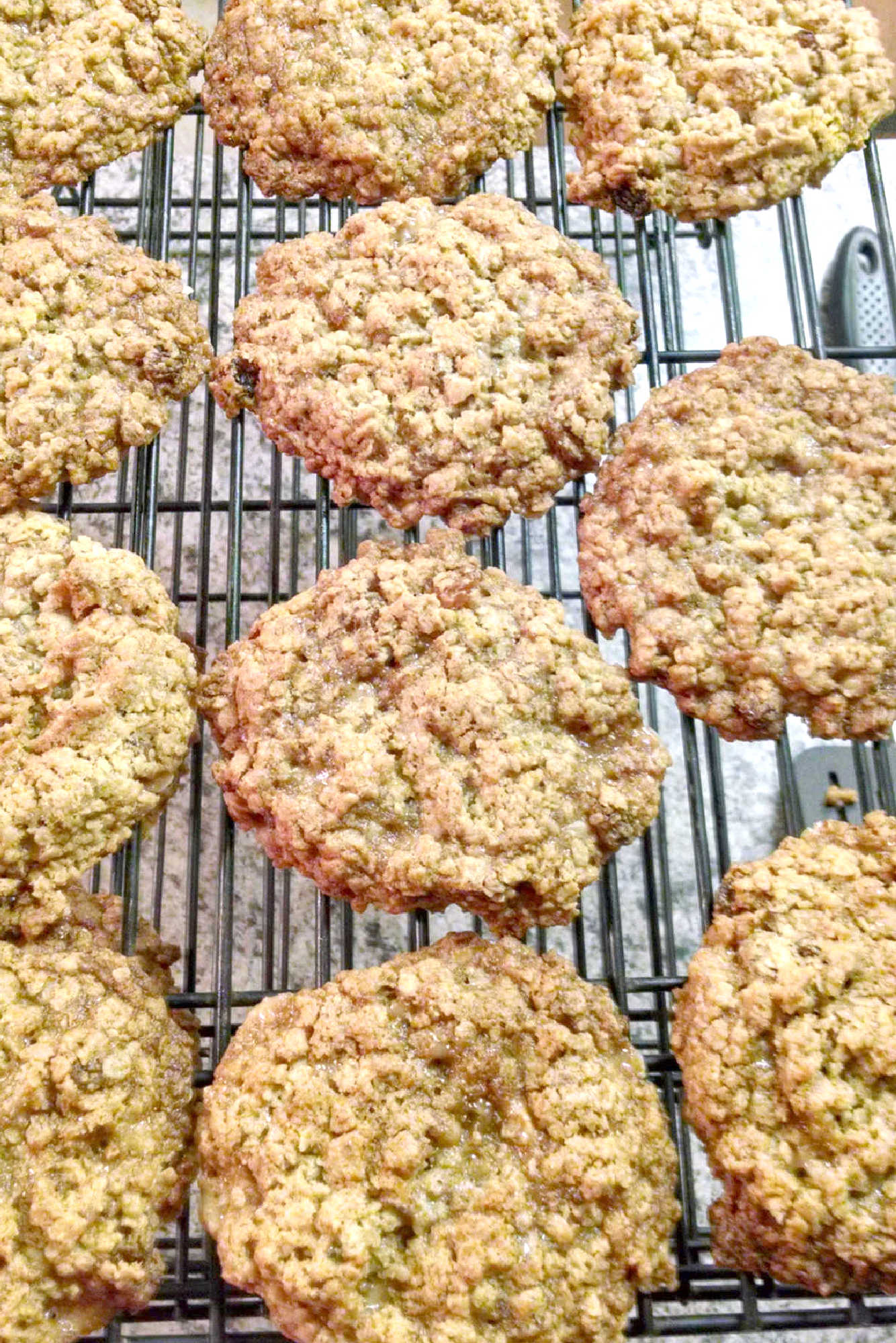 Classic oatmeal raisin cookies meet buttery candy-shop crunch in this chewy toffee cookie recipe. These Oatmeal Raisin Toffe Cookies are cozy enough for fall baking and fun enough for a cookie tray.  #OatmealCookies #RaisinCookies #ToffeeCookies #CookieRecipe #HolidayBaking #OurFamilyTable